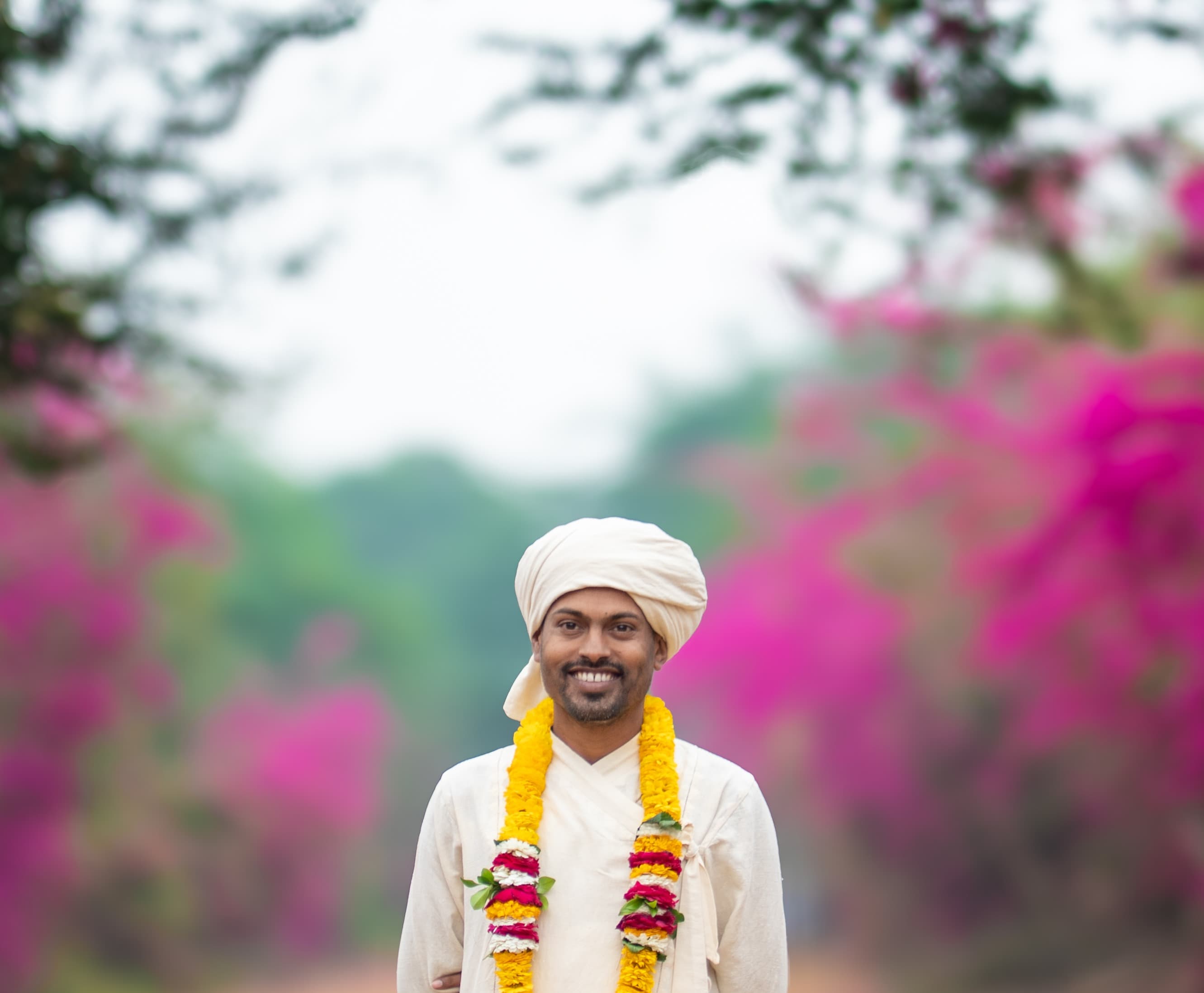 HH Paramguru Ji standing serenely among bamboo